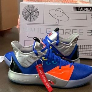 Paul George three Nike sneakers